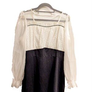 Classy black and white dress with ruffle sleeve - Size XL